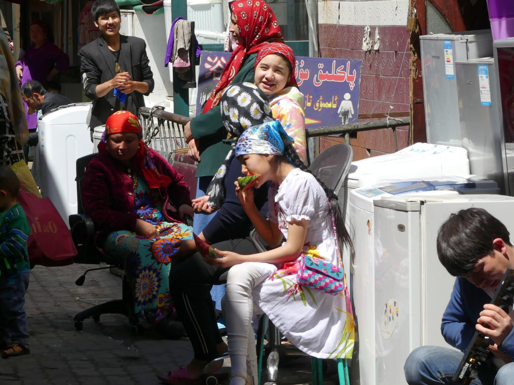 Uyghur Locals having Food Business together Silk Road