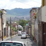 Morelia, City street, cars, hills, houses